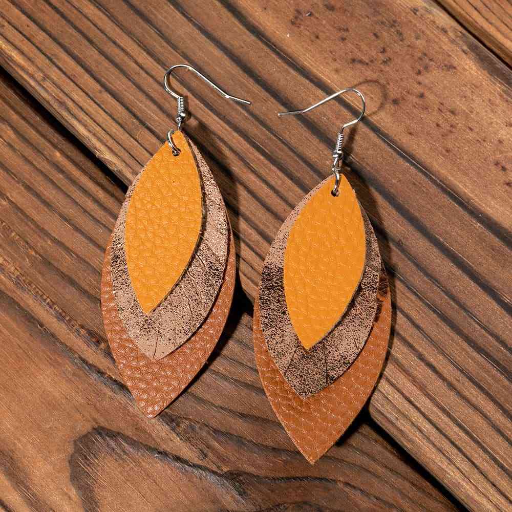 PU Leather Drop Earrings
Material: Alloy, PU
Care instructions: Avoid wearing during exercise, as sweat will react with the jewelry to produce silver chloride and copper sulfide, which causAccessoriesDalilly Designs BoutiquePU Leather Drop Earrings