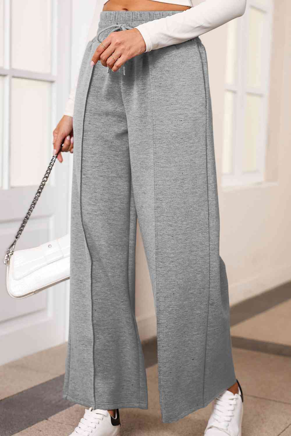 Drawstring Wide Leg Pants with Pockets
Features: Pocketed
Sheer: Opaque
Material composition: 50% polyester, 45% viscose, 5% elastane
Care instructions: Machine wash cold. Tumble dry low.
Imported
ProducDalilly Designs BoutiqueDrawstring Wide Leg Pants