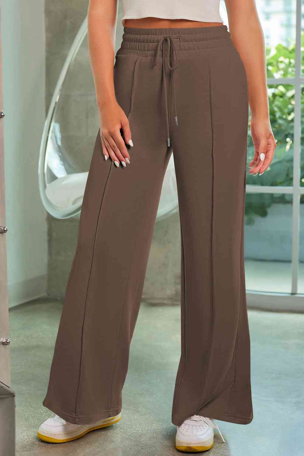 Drawstring Wide Leg Pants with Pockets
Features: Pocketed
Sheer: Opaque
Material composition: 50% polyester, 45% viscose, 5% elastane
Care instructions: Machine wash cold. Tumble dry low.
Imported
ProducDalilly Designs BoutiqueDrawstring Wide Leg Pants