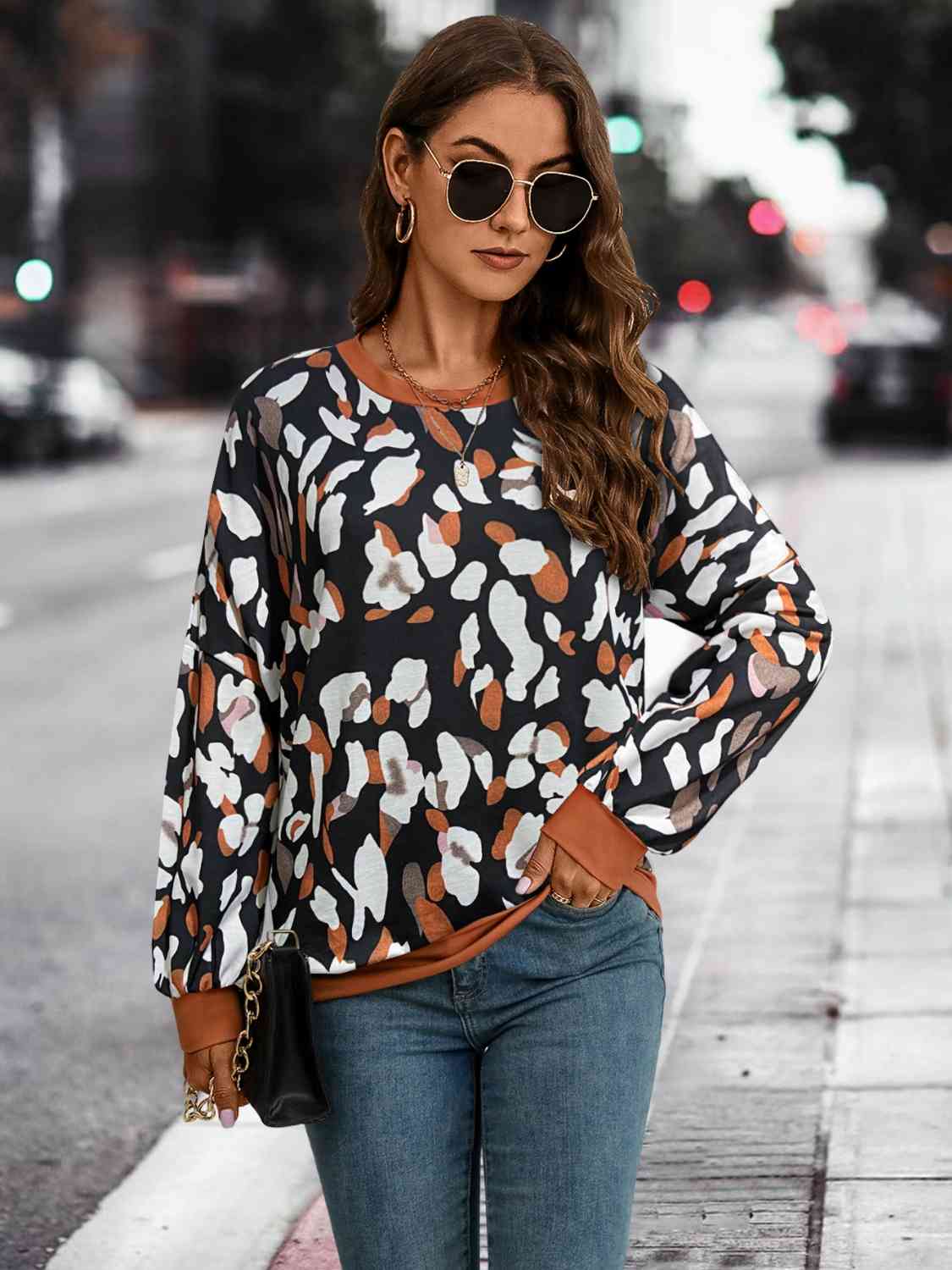 Leopard Round Neck Drop Shoulder Sweatshirt
Features: Basic style
Sheer: Opaque
Stretch: No stretch
Material composition: 95% polyester, 5% spandex
Care instructions: Machine wash cold. Tumble dry low.
ImportTopsDalilly Designs BoutiqueLeopard Round Neck Drop Shoulder Sweatshirt