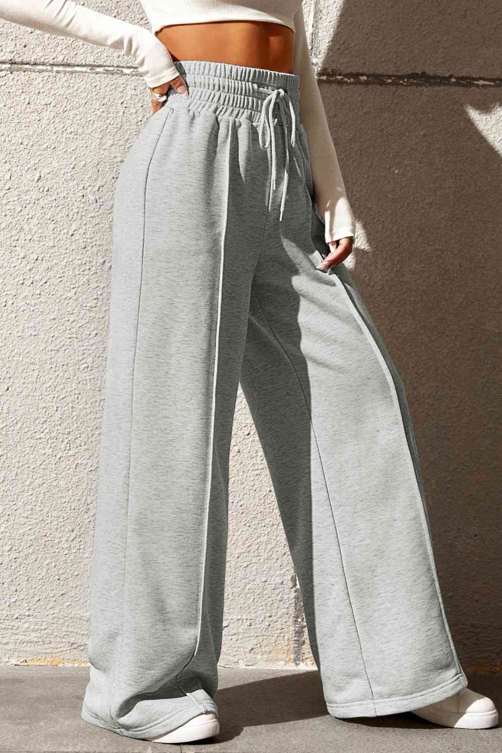 Drawstring Wide Leg Pants with Pockets
Features: Pocketed
Sheer: Opaque
Material composition: 50% polyester, 45% viscose, 5% elastane
Care instructions: Machine wash cold. Tumble dry low.
Imported
ProducDalilly Designs BoutiqueDrawstring Wide Leg Pants