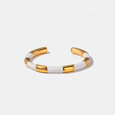 18K Gold-Plated Stainless Steel Bracelet
Pieces: 1-piece
Material: 18K gold-plated, Stainless steel
Care instructions: Avoid wearing during exercise, as sweat will react with the jewelry to produce silver AccessoriesDalilly Designs Boutique18K Gold-Plated Stainless Steel Bracelet