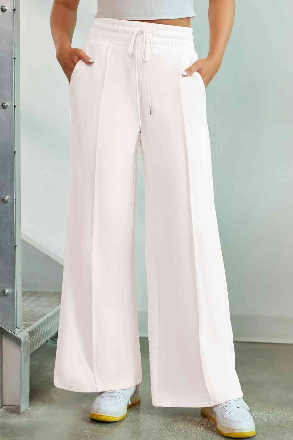 Drawstring Wide Leg Pants with Pockets
Features: Pocketed
Sheer: Opaque
Material composition: 50% polyester, 45% viscose, 5% elastane
Care instructions: Machine wash cold. Tumble dry low.
Imported
ProducDalilly Designs BoutiqueDrawstring Wide Leg Pants