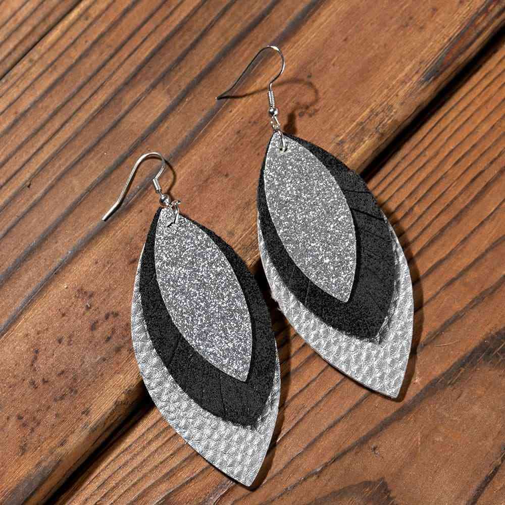 PU Leather Drop Earrings
Material: Alloy, PU
Care instructions: Avoid wearing during exercise, as sweat will react with the jewelry to produce silver chloride and copper sulfide, which causAccessoriesDalilly Designs BoutiquePU Leather Drop Earrings