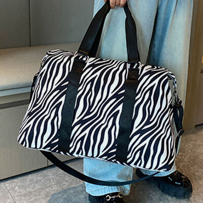 Animal Print Travel Bag
Bag size: Large
Material: Oxford cloth
Imported
Product measurements:One Size:Actual Length 20.1 in, Actual Width 7.9 in, Actual Height 11 in, Weight 14.8 oz
Shoes & BagsDalilly Designs BoutiqueAnimal Print Travel Bag