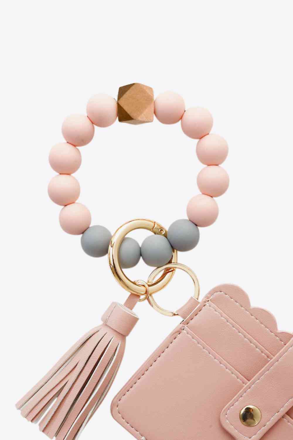 2-Pack Mini Purse Tassel Key Chain
Piece: 2
Features: Tassel
Material: Silicone, wood beads, alloy, PU
Imported
Product measurements: beads diameter 3.3 in, wallet length 4.1 in
AccessoriesDalilly Designs Boutique2-Pack Mini Purse Tassel Key Chain