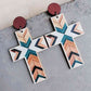 Cross Drop Earrings
Material: Wood
Care instructions: 1. Use a soft cloth to wipe. After each wear, you can use a soft cloth to wipe. 2. Avoid contact with water, as prolonged exposureAccessoriesDalilly Designs BoutiqueCross Drop Earrings