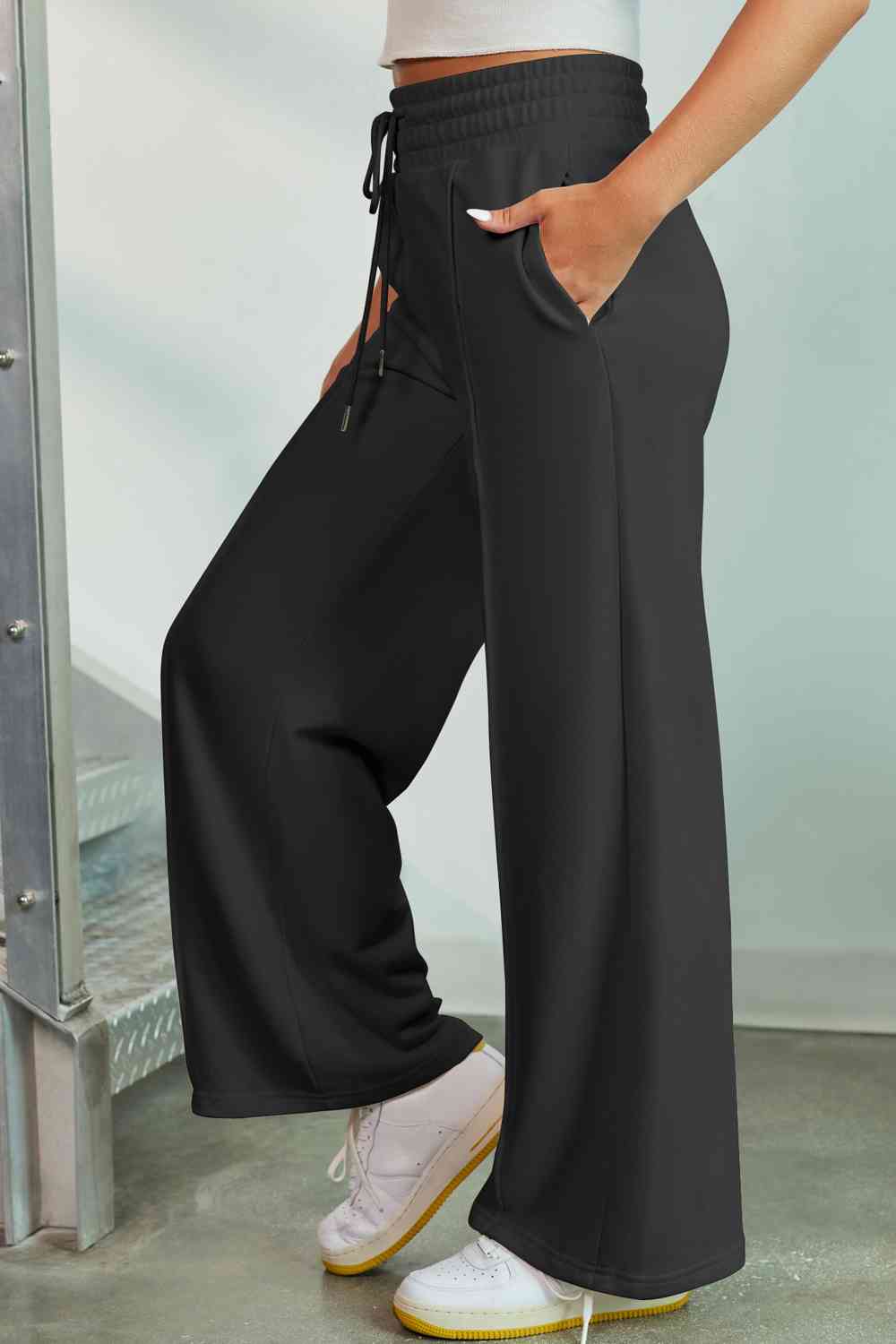 Drawstring Wide Leg Pants with Pockets
Features: Pocketed
Sheer: Opaque
Material composition: 50% polyester, 45% viscose, 5% elastane
Care instructions: Machine wash cold. Tumble dry low.
Imported
ProducDalilly Designs BoutiqueDrawstring Wide Leg Pants