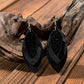 PU Leather Drop Earrings
Material: Alloy, PU
Care instructions: Avoid wearing during exercise, as sweat will react with the jewelry to produce silver chloride and copper sulfide, which causAccessoriesDalilly Designs BoutiquePU Leather Drop Earrings