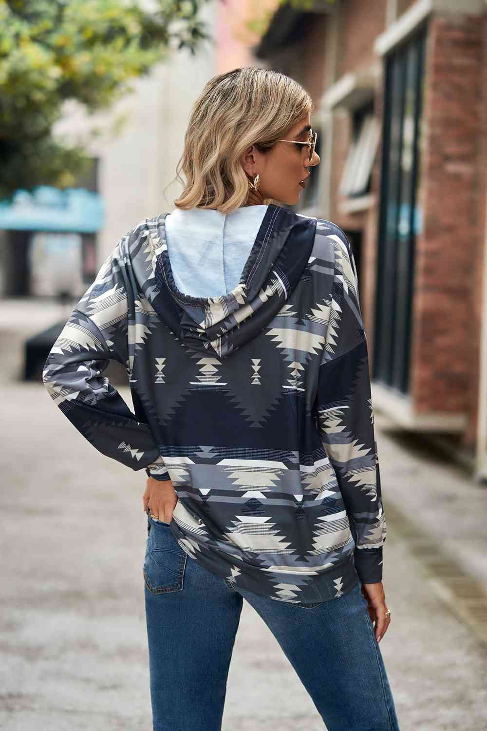 Geometric Drawstring Dropped Shoulder Hoodie
Features: Tied
Sheer: Opaque
Stretch: Slightly stretchy
Material composition: 65% rayon, 30% polyester, 5% spandex
Care instructions: Machine wash cold. Tumble dry TopsDalilly Designs BoutiqueGeometric Drawstring Dropped Shoulder Hoodie