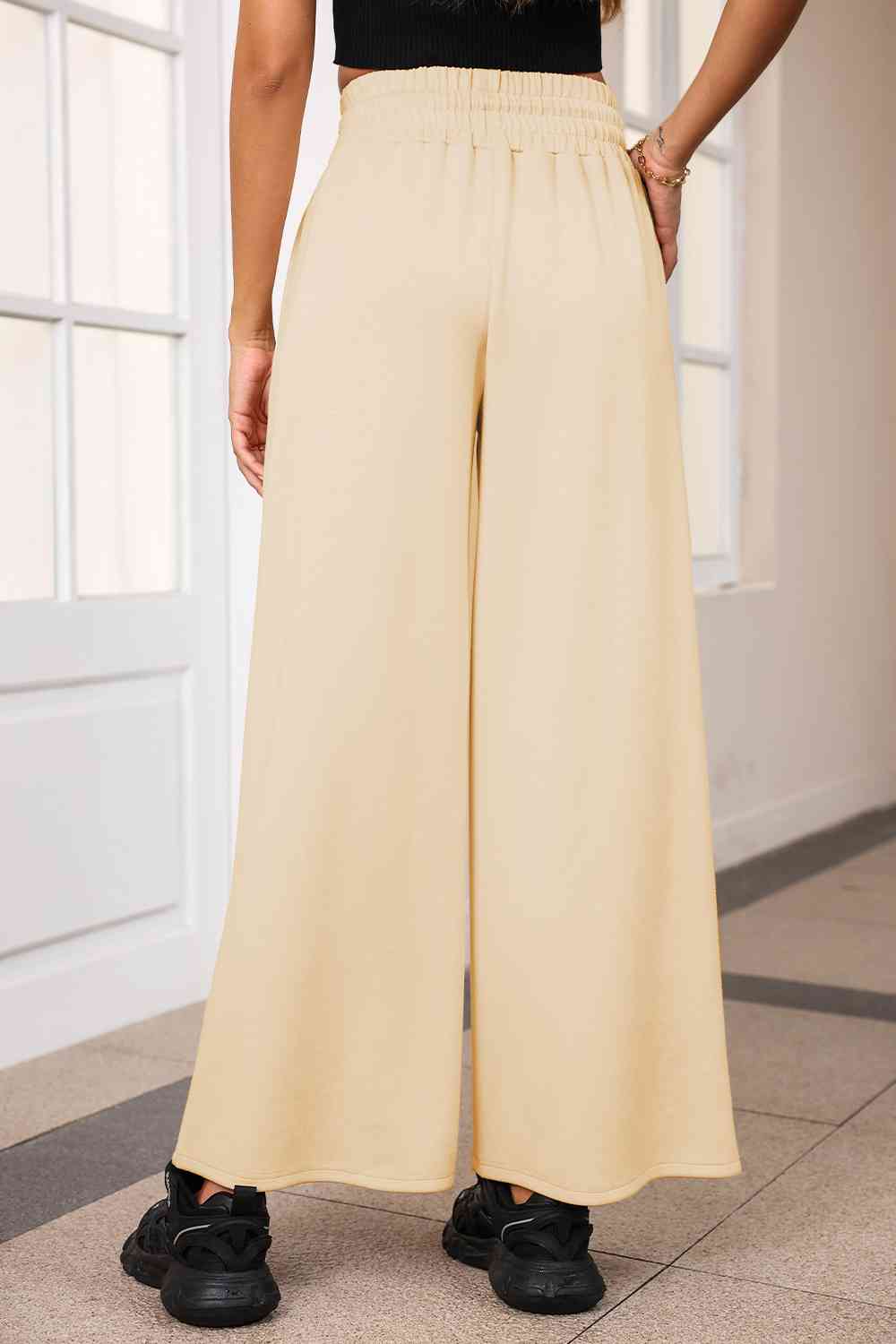 Drawstring Wide Leg Pants with Pockets
Features: Pocketed
Sheer: Opaque
Material composition: 50% polyester, 45% viscose, 5% elastane
Care instructions: Machine wash cold. Tumble dry low.
Imported
ProducDalilly Designs BoutiqueDrawstring Wide Leg Pants