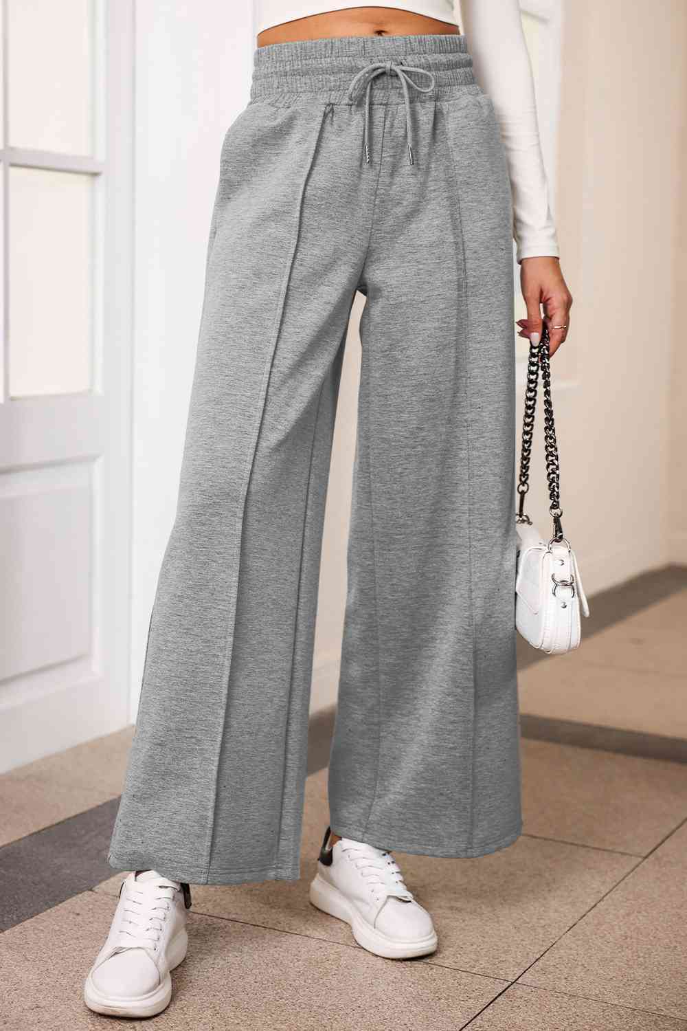 Drawstring Wide Leg Pants with Pockets
Features: Pocketed
Sheer: Opaque
Material composition: 50% polyester, 45% viscose, 5% elastane
Care instructions: Machine wash cold. Tumble dry low.
Imported
ProducDalilly Designs BoutiqueDrawstring Wide Leg Pants