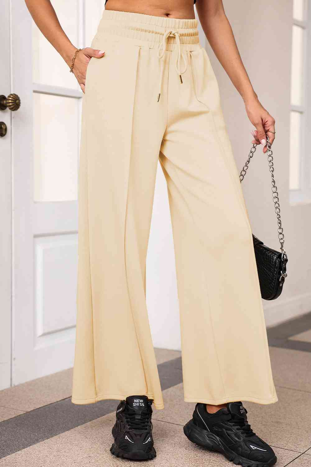 Drawstring Wide Leg Pants with Pockets
Features: Pocketed
Sheer: Opaque
Material composition: 50% polyester, 45% viscose, 5% elastane
Care instructions: Machine wash cold. Tumble dry low.
Imported
ProducDalilly Designs BoutiqueDrawstring Wide Leg Pants