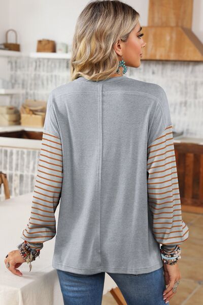 Striped Round Neck Lantern Sleeve Sweatshirt
Features: Basic style
Sheer: Opaque
Stretch: Slightly stretchy
Material composition: 95% polyester, 5% elastane
Care instructions: Machine wash cold. Tumble dry lowTopsDalilly Designs BoutiqueStriped Round Neck Lantern Sleeve Sweatshirt