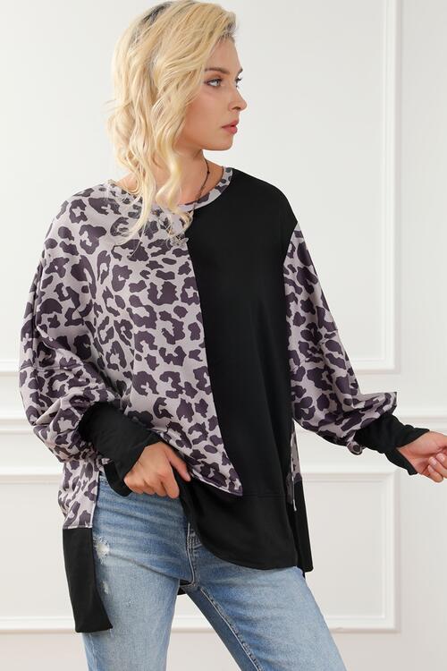 Leopard Round Neck Lantern Sleeve Slit Sweatshirt
Features: Slit
Sheer: Opaque
Stretch: Slightly stretchy
Material composition: 75% polyester, 20% viscose, 5% elastane
Care instructions: Machine wash cold. Tumble dTopsDalilly Designs BoutiqueLeopard Round Neck Lantern Sleeve Slit Sweatshirt