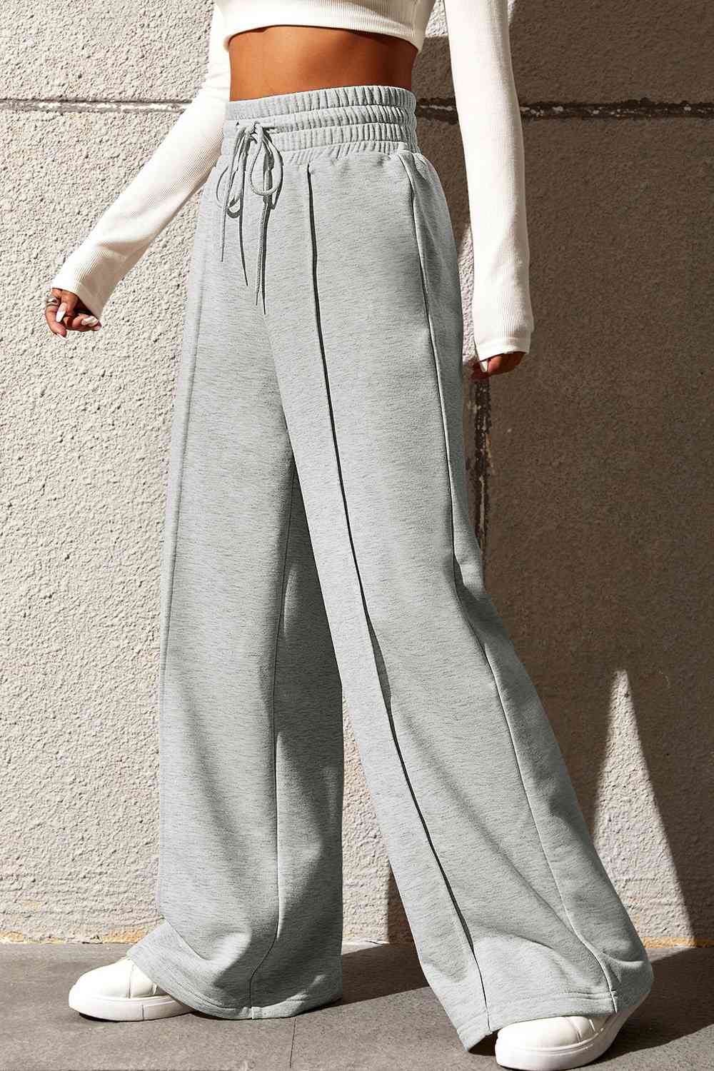 Drawstring Wide Leg Pants with Pockets
Features: Pocketed
Sheer: Opaque
Material composition: 50% polyester, 45% viscose, 5% elastane
Care instructions: Machine wash cold. Tumble dry low.
Imported
ProducDalilly Designs BoutiqueDrawstring Wide Leg Pants