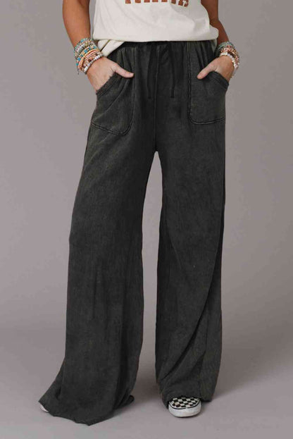 Wide Leg Pocketed Pants
Pattern type: Solid
Style: Casual
Features: Pocketed, Drawstring
Length: Long
Material composition: 80% polyester, 20% cotton
Care instructions: Machine wash cold. BottomsDalilly Designs BoutiqueWide Leg Pocketed Pants