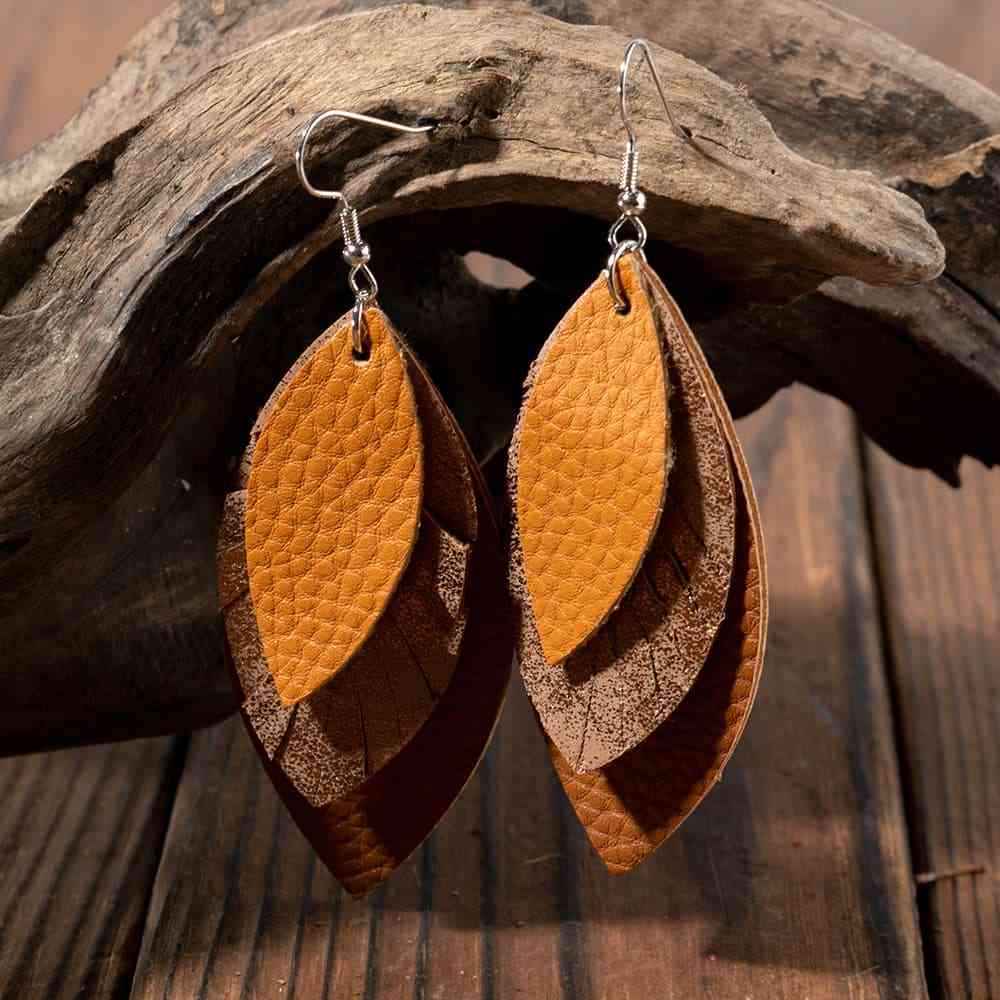 PU Leather Drop Earrings
Material: Alloy, PU
Care instructions: Avoid wearing during exercise, as sweat will react with the jewelry to produce silver chloride and copper sulfide, which causAccessoriesDalilly Designs BoutiquePU Leather Drop Earrings